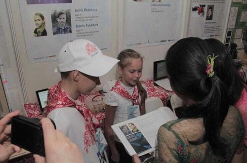 Anna Riaskina, Aged 9 and Denis Tselikov, aged 11 exhibit their innovation in IYIA 2018